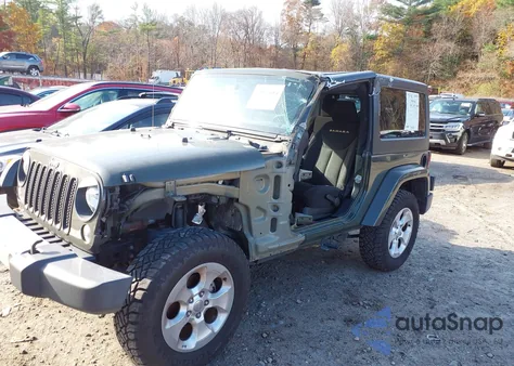 2015 Jeep Wrangler Sahara z USA, uszkodzony, nr VIN 1C4AJWBG6FL694473